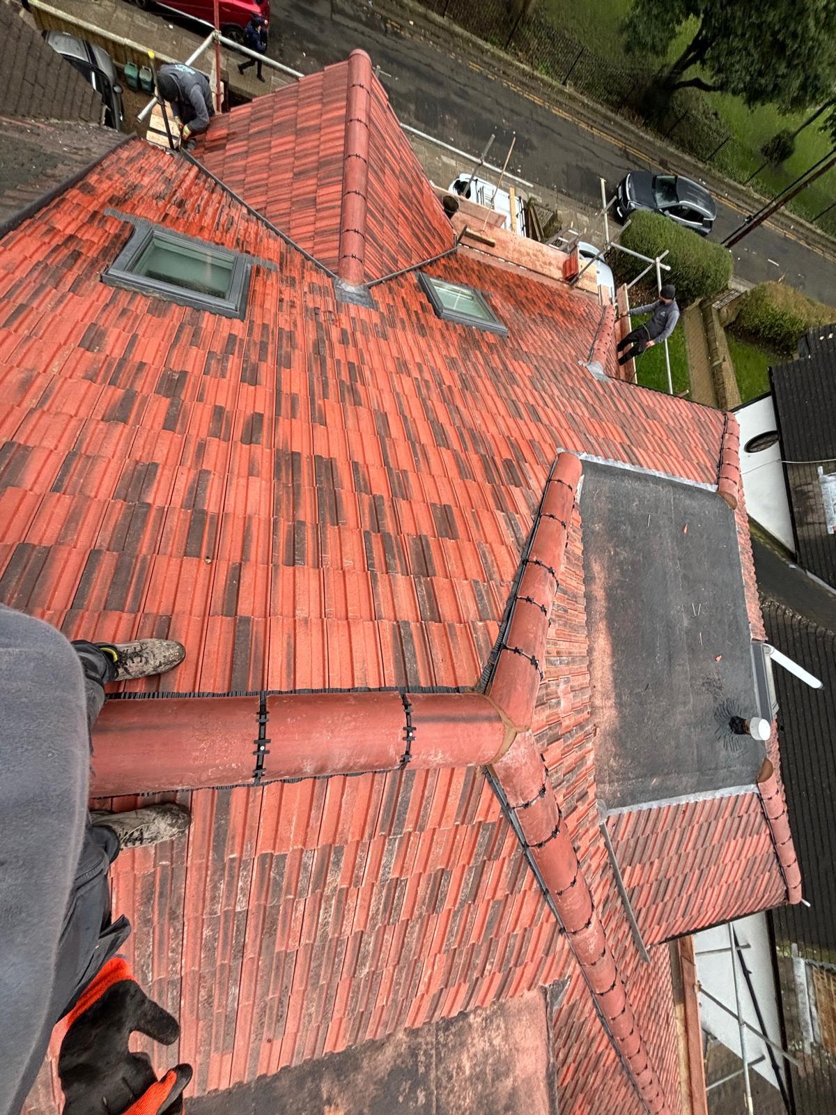 Newly installed tiled roof with neat ridge detail