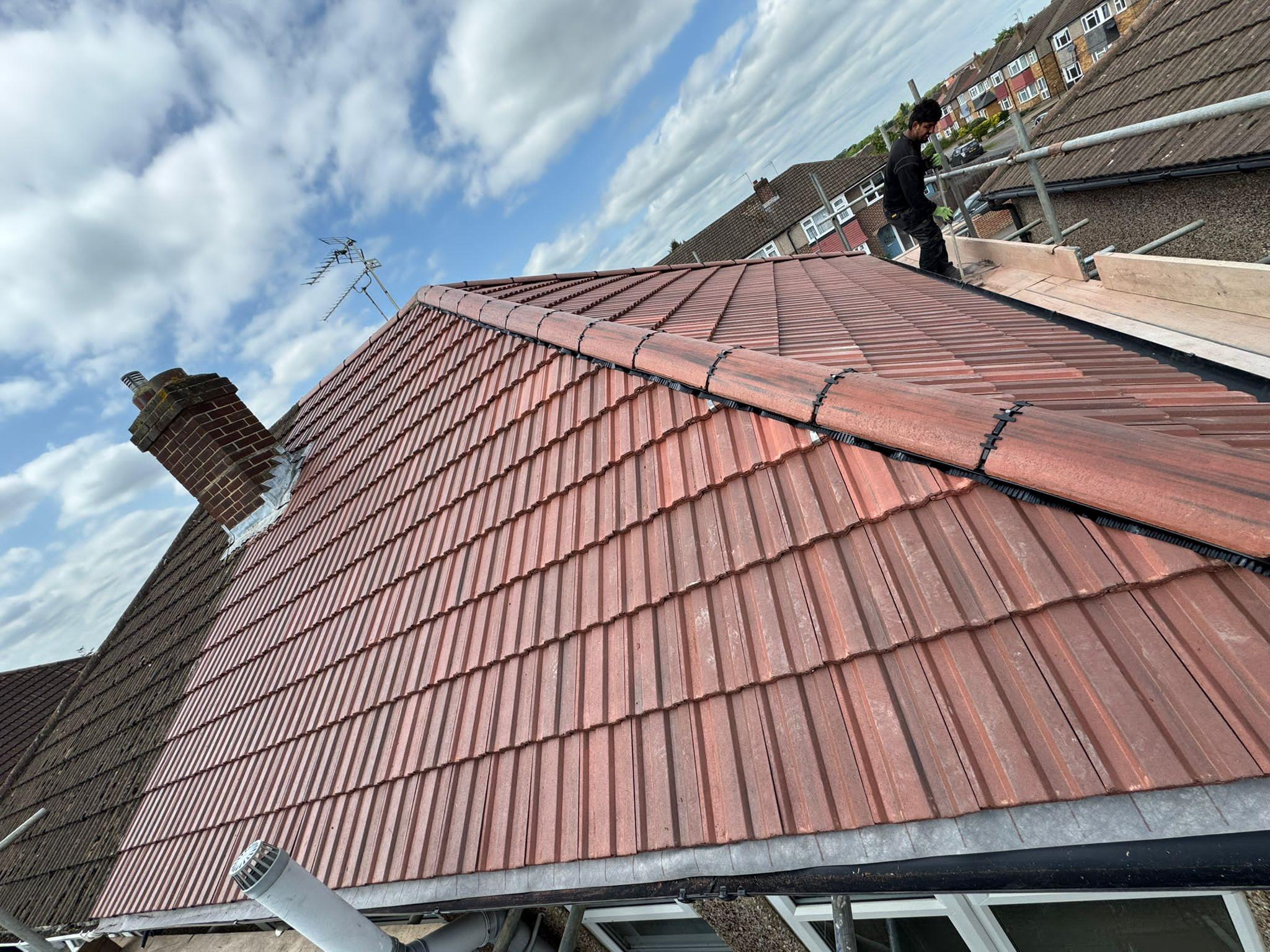 Roof repair work addressing slate tiles and flashing detail by ATS Roofing